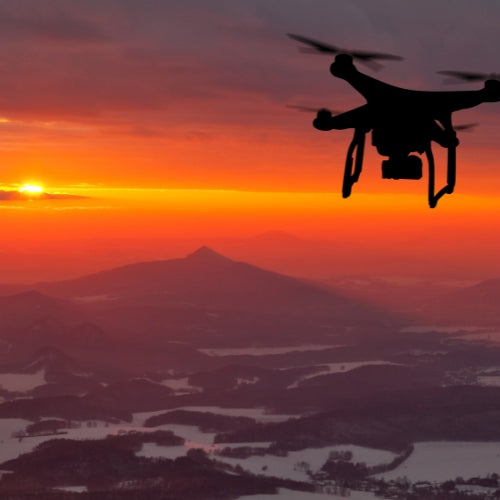 Drone taking a shot of mountain and sunset